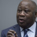 Former Ivory Coast President Laurent Gbagbo gestures as he enters the courtroom of the International Criminal Court in The Hague on January 15, 2019, where judges were expected to issue rulings on requests by Gbagbo and ex-government minister Charles Ble Goude to have their prosecutions thrown out for lack of evidence. – The International Criminal Court on January 15 acquitted former Ivory Coast president Laurent Gbagbo over post-electoral violence in the West African nation in a stunning blow to the war crimes tribunal in The Hague. Judges ordered the immediate release of the 73-year-old deposed strongman, the first head of state to stand trial at the troubled ICC, and his right-hand man Charles Ble Goude. (Photo by Peter Dejong / ANP / AFP) / Netherlands OUT