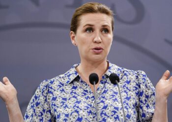 Denmark’s Prime Minister Mette Frederiksen gives a press conference on the corona strategy for the coming months in the Mirror Hall at the Prime Minister’s Office in Copenhagen, on June 22, 2022. (Photo by Mads Claus Rasmussen / Ritzau Scanpix / AFP) / Denmark OUT