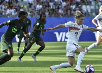 [FILE] Nigeria’s defender Chidinma Okeke (L) vies with Germany’s midfielder Svenja Huth during the France 2019 Women’s World Cup round of sixteen football match between Germany and Nigeria, on June 22, 2019, at the Stades des Alpes stadium in Grenoble, central eastern France. Jean-Philippe KSIAZEK / AFP