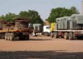 Freight trucks are parked in Hasahisa city in al-Jazirah state on July 22, 2023, as road transport is drastically reduced in war-torn Sudan. – With air strikes, artillery blasts and countless checkpoints around Khartoum, road traffic across the country has dropped by 90 percent since fighting began on April 15, according to a report by Sudan’s national chamber of transport. (Photo by – / AFP)