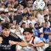 Real Madrid’s Spaniard defender Francisco Garcia (L) fights for the ball with AC Milan’s Argentine midfielder Luka Romero during the friendly football match between Real Madrid and AC Milan at the Rose Bowl in Pasadena, California, on July 23, 2023. (Photo by Frederic J. BROWN / AFP)