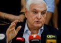 (FILES) Panama’s former president (2009-2014) Ricardo Martinelli speaks during a press conference at the Realizando Metas party headquarters in Panama City, on June 27, 2023. – The former Panamanian president, Ricardo Martinelli, who aspires to return to power in 2024 despite having pending cases with the justice system, was sentenced to almost 11 years in prison for money laundering during his term in office, the judicial body reported on Tuesday. (Photo by Roberto CISNEROS / AFP)