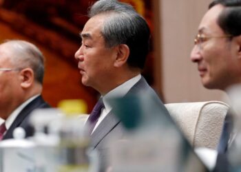 Director of the Office of the Foreign Affairs Commission of the Communist Party of China’s Central Committee Wang Yi (C) attends a meeting with US Climate Envoy John Kerry at the Great Hall of the People in Beijing on July 18, 2023. (Photo by FLORENCE LO / POOL / AFP)