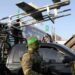 Fighters of the Hamas military wing Ezzedin al-Qassam Brigades display military hardware during a parade in the Gaza city of Rafah a week after Hamas and Israel agreed a ceasefire ending a deadly and devastating 11-day confrontation – AFP