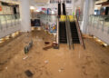 Flood water covers the floor of a shopping mall in Hong Kong on September 8, 2023. - Record rainfall in Hong Kong caused widespread flooding in the early hours on September 8, disrupting road and rail traffic just days after the city dodged major damage from a super typhoon. (Photo by Bertha WANG / AFP)