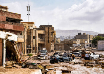 This handout picture provided by the office of Libya’s Benghazi-based interim prime minister on September 11, 2023 shows a view of destroyed vehicles and damaged buildings in the eastern city of Derna, about 290 kilometres east of Benghazi, in the wake of the Mediterranean storm “Daniel”. – At least 150 people were killed when freak floods hit eastern Libya, officials said on September 11, after the storm’s torrential rains battered Turkey, Bulgaria, and Greece. (Photo by The Press Office of Libyan Prime Minister / AFP)