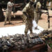 Nigerian soldiers make an inventory of small arms and light weapons recovered from bandits during Operation Safe Haven and during the military mop up in Jos and surrounding areas in Plateau State in northcentral Nigeria. – (Photo by PIUS UTOMI EKPEI / AFP)