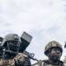 Kenyan soldiers land in the city of Goma, eastern Democratic Republic of Congo on November 12, 2022, as part of a regional military operation targeting rebels in the region. – Their arrival comes as the M23 militia has surged across the DRC’s North Kivu province, capturing swathes of territory and inflaming tensions in central Africa. (Photo by ALEXIS HUGUET / AFP)