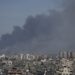 EDITORS NOTE: Graphic content / Smoke billows over the Israeli side of the border with Gaza as seen from Gaza City on October 7, 2023 following a series of early morning rocket attacks from the Gaza Strip into Israel. Palestinian militants have begun a “war” against Israel, the country’s defence minister said on October 7 after a barrage of rockets were fired and fighters from the Palestinian enclave infiltrated Israel, a major escalation in the Israeli-Palestinian conflict. (Photo by MOHAMMED ABED / AFP)