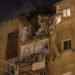 A building in Tel Aviv is damaged by a rocket fired by Palestinian militants from the Gaza Strip on October 7, 2023. – Palestinian militant group Hamas launched a surprise large-scale attack against Israel on October 7, firing thousands of rockets from Gaza and sending fighters to kill or abduct people as Israel retaliated with devastating air strikes. (Photo by JACK GUEZ / AFP)