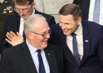 Estonian Defence Minister Hanno Pevkur (R) greets Canada’s Defence Minister Bill Blair (L) before an official family photo with other attendees of the NATO Council Defence Ministers Session at the NATO headquarters in Brussels on October 12, 2023. – NATO countries told Israel’s defence minister they stood by his country after the attack by Hamas, but urged his forces to respond with “proportionality”, the alliance said. (Photo by SIMON WOHLFAHRT / AFP)