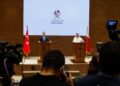 Qatar’s Prime Minister and Foreign Minister Mohammed bin Abdulrahman al-Thani (R) and Turkey’s Foreign Minister Hakan Fidan hold a press conference in Doha on October 25, 2023. (Photo by KARIM JAAFAR / AFP)