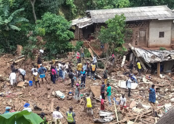 A general scene of destruction caused by a landslide in the district of Mbankolo, northwest of Yaounde, on October 9, 2023. - At least 27 people have been killed after heavy rains caused a section of a hillside covered in precariously built houses to collapse in Cameroon's capital Yaounde.
Rescuers were still searching for victims after the landslide that happened on the evening of October 8, 2023. 
Landslides are frequent during the rainy season in Yaounde, a city of nearly three million people, where often precarious dwellings are built on its many hills. (Photo by Romuald Nkonlak / AFP)