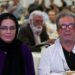 (FILES) Iranian film director Dariush Mehrjui and his wife Vahida Mohammadifar attend a ceremony in Tehran on July 1, 2015. – One of Iran’s most important film-makers, Mehrjui, was stabbed to death on October 14 alongside his wife at their home near the Iranian capital. The 83-year-old was indelibly associated with the Iranian new wave of cinema, having made “The Cow” in 1969, one of the movement’s first films. (Photo by Abdulwahed MIRZAZADEH / isna news / AFP)