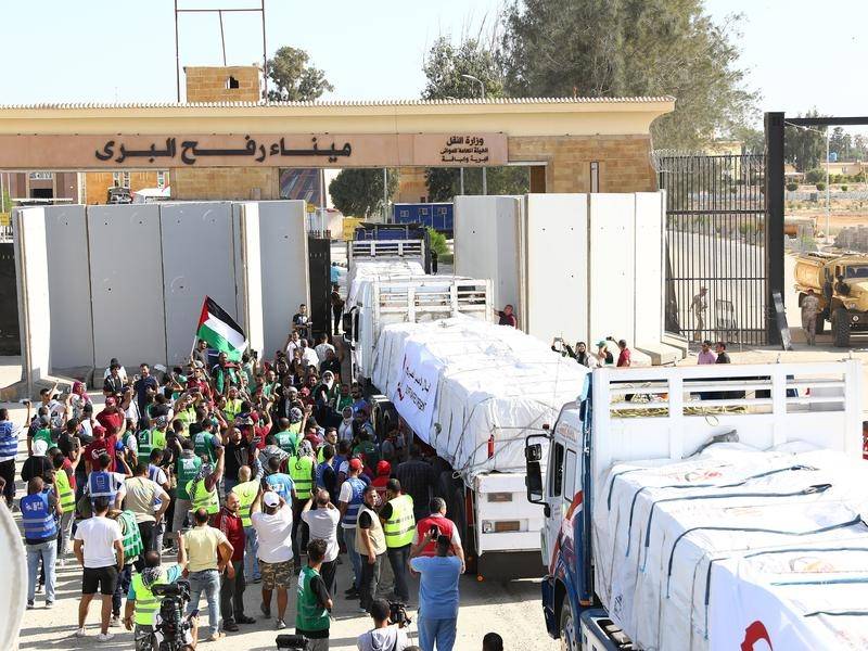 First aid trucks enter besieged Gaza from Egypt