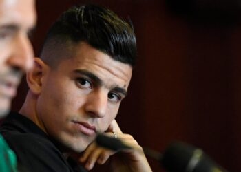 (FILES) Algeria's defender Youcef Atal attends a press conference at the 30 June Stadium in Cairo on July 6, 2019, on the eve of the 2019 Africa Cup of Nations (CAN) Round of 16 football match between Algeria and Guinea. - Ligue 1 side Nice suspended Algerian international Youcef Atal "until further notice" on Wednesday after he shared a controversial post on social media linked to the conflict between Israel and the Palestinian Islamist movement Hamas. (Photo by Khaled DESOUKI / AFP)