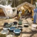 FILE – Health workers attend to patients suffering from cholera symptoms at a local hospital in Harare, Tuesday, Sept, 11, 2018. Zimbabwe has recorded 100 suspected deaths from cholera and more than 5,000 possible cases since late Sept. 2023. That has prompted the government to impose restrictions to stop the spread of the disease, including limiting numbers at funerals and stopping some social gatherings in affected areas. (AP Photo/Tsvangirayi Mukwazhi, File)