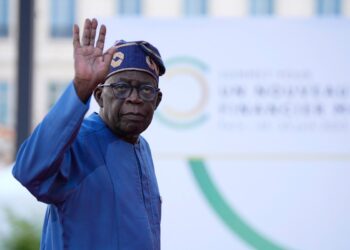 (FILES) Nigeria President Bola Tinubu arrives for the closing session of the New Global Financial Pact Summit, on June 23, 2023 in Paris. – Nigeria’s Supreme Court on October 26, 2023 rejected the opposition’s challenges to President Bola Ahmed Tinubu’s election victory, validating his mandate after the last legal challenge. A seven-judge panel ruled as without merit opposition appeals over claims of fraud, electoral law violations and Tinubu’s ineligibility to run for president. (Photo by Lewis Joly / POOL / AFP)