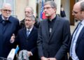 Grand Rabbi of France Haim Korsia (2ndL), flanked by Rector of the Great Mosque of Paris, Chems-eddine Hafiz (L), Archbishop of Reims and President of the Conference des Eveques de France (CEF – Bishops’ Conference of France) Eric de Moulins-Beaufort (C), President of the Protestant Federation of France (FPF) Christian Krieger (R), addresses media during a press conference after a meeting between France’s President and France’s religious representatives at the presidential Elysee Palace in Paris on November 13, 2023, one day after the anti-Semitism protests in France and after having himself appealed for national unity in a letter to the French. – Thousands of civilians, both Palestinians and Israelis, have died since October 7, 2023, after Palestinian Hamas militants based in the Gaza Strip entered southern Israel in an unprecedented attack triggering a war declared by Israel on Hamas with retaliatory bombings on Gaza. (Photo by Ludovic MARIN / AFP)