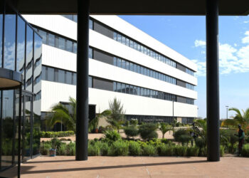 A general view of the new United Nations (UN) regional headquarters in Diamniadio on November 22, 2023. – Built on a 13 hectare site, it will eventually be able to accommodate more than 3000 staff and 2000 officials and visitors and to accommodate 34 United Nations agencies present in Senegal. (Photo by Seyllou / AFP)