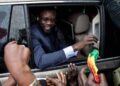 (FILES) Ousmane Sonko(C), President of the opposition party Senegalese Patriots for Work, Ethics and Brotherhood (PASTEF), waves good bye to his supporters at the HLM basic school in Ziguinchor on July 3, 2022. – The West African ECOWAS court said on November 17, 2023 that Senegal did not violate jailed opposition figure Ousmane Sonko’s rights, dealing a blow to his chances of running in the 2024 presidential election. (Photo by MUHAMADOU BITTAYE / AFP)