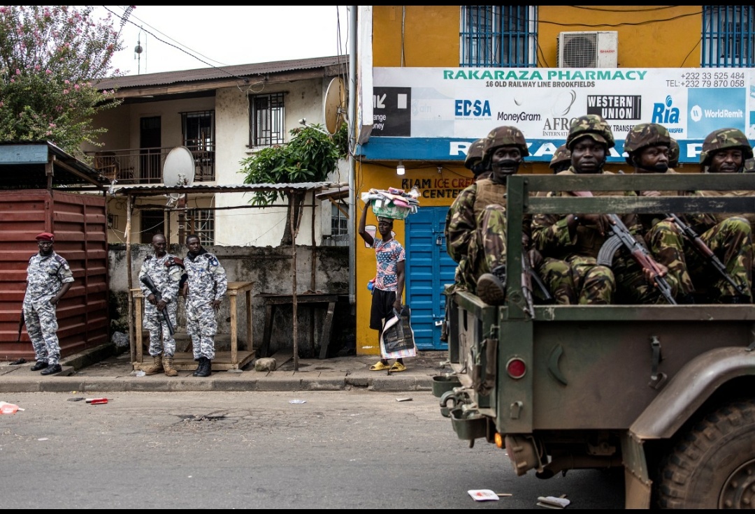 Curfew partially lifted in Sierra Leone capital after clashes killed 13 soldiers