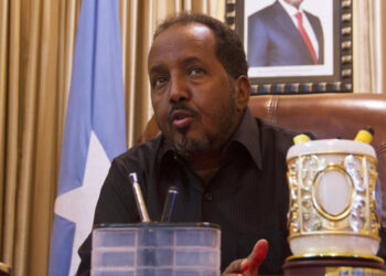 (FILES) This file photo taken on March 02, 2014 shows President of the Federal Republic of Somalia Hassan Sheikh Mohamud speaking to journalists during an interview at the Somali State House in Mogadishu.Somalia is due to hold its presidential election on February 8, 2017 after numerous delays, with ongoing security concerns and warnings of famine topping the agenda for the new administration. President Hassan Sheikh Mohamud is seeking re-election against 22 other candidates. The troubled Horn of Africa nation, which has not had an effective central government in three decades, had been promised a one-person, one-vote election in 2016./ AFP PHOTO / Isaac KASAMANI