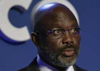 Liberia’s President George Weah (Photo by JULIEN DE ROSA / POOL / AFP)