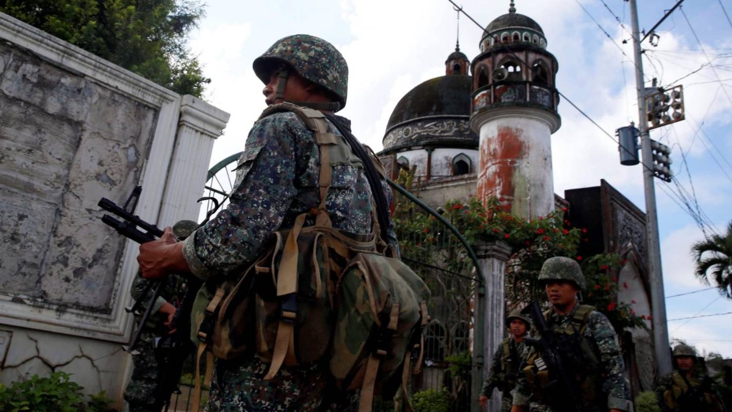 Philippines says air strike cripples Islamist militant group