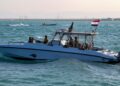 Yemeni coastguard members loyal to the internationally-recognised government ride in a patrol boat in the Red Sea off of the government-held town of Mokha in the western Taiz province, close to the strategic Bab al-Mandab Strait, on December 12, 2023. (Photo by Khaled ZIAD / AFP)