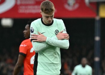 Chelsea’s English midfielder #20 Cole Palmer celebrates after scoring the opening goal of the English Premier League football match between Luton Town and Chelsea at Kenilworth Road in Luton, north of London on December 30, 2023. (Photo by Ben Stansall / AFP)