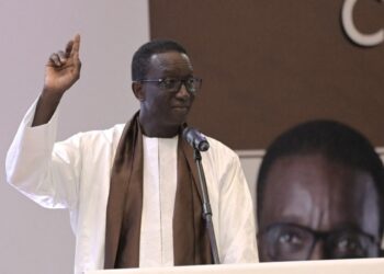 Senegalese Prime Minister Amadou Ba speaks in Dakar on December 21, 2023 after he was named the ruling party’s presidential candidate ahead of the February 2024 presidential election. (Photo by Seyllou / AFP)