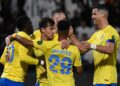 Nassr’s Portuguese forward #07 Cristiano Ronaldo celebrates with his teammates during the King Cup quarter-final football match between Al-Shabab and Al-Nassr at the Al-Shabab Club Stadium in Riyadh on December 11, 2023. (Photo by AFP)