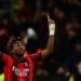 AC Milan’s Nigerian midfielder Samuel Chukwueze celebrates after scoring the team’s first goal during the UEFA Champions League Group F football match between AC Milan and Borussia Dortmund at the San Siro stadium in Milan on November 28, 2023. (Photo by AFP)