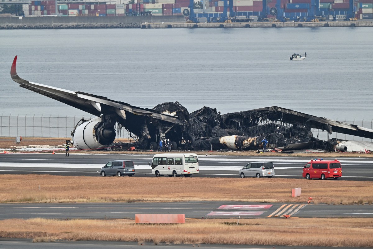 Japan Airlines pilots had no ‘visual contact’ before collision