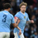 Manchester City's Portuguese defender #03 Ruben Dias (L) passes the captain's armband to Manchester City's Belgian midfielder #17 Kevin De Bruyne (R) during the English FA Cup third round football match between Manchester City and Huddersfield Town at the Etihad Stadium in Manchester, north west England, on January 7, 2024. (Photo by Paul ELLIS / AFP) / RESTRICTED TO EDITORIAL USE. NO USE WITH UNAUTHORIZED AUDIO, VIDEO, DATA, FIXTURE LISTS, CLUB/LEAGUE LOGOS OR 'LIVE' SERVICES. ONLINE IN-MATCH USE LIMITED TO 120 IMAGES. AN ADDITIONAL 40 IMAGES MAY BE USED IN EXTRA TIME. NO VIDEO EMULATION. SOCIAL MEDIA IN-MATCH USE LIMITED TO 120 IMAGES. AN ADDITIONAL 40 IMAGES MAY BE USED IN EXTRA TIME. NO USE IN BETTING PUBLICATIONS, GAMES OR SINGLE CLUB/LEAGUE/PLAYER PUBLICATIONS. - RESTRICTED TO EDITORIAL USE. No use with unauthorized audio, video, data, fixture lists, club/league logos or 'live' services. Online in-match use limited to 120 images. An additional 40 images may be used in extra time. No video emulation. Social media in-match use limited to 120 images. An additional 40 images may be used in extra time. No use in betting publications, games or single club/league/player publications. /