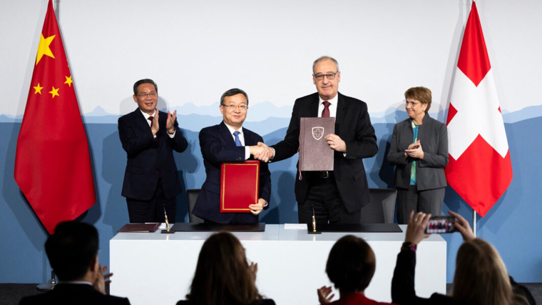 China-Swiss talks touch on visa-free travel, free trade