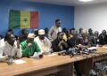 Members of civil society groups and religious leaders speak during a press statement at the headquarters of the Federation of Women’s Associations of Senegal (FAFS) in Dakar on February 8, 2024. – A collective of Senegalese civil society groups on February 8, 2024 called for mass mobilisation against the delay to this month’s presidential poll, outlining a series of planned actions including a protest and a strike as the country faces a political crisis. (Photo by Seyllou / AFP)