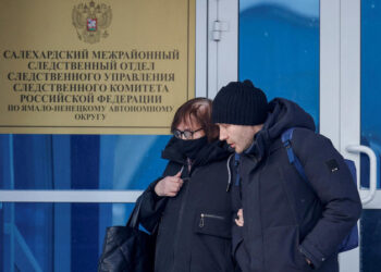 Russian opposition leader Alexei Navalny’s mother Lyudmila Navalnaya and his lawyer Alexei Tsvetkov walk out of an office of the Investigative Committee’s regional department in the city of Salekhard, Russia, on Feb. 19, 2024. (Reuters)