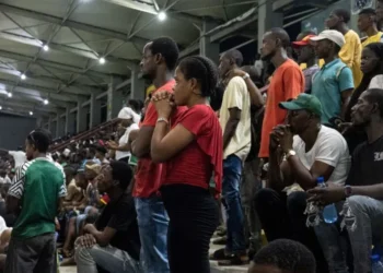 Nigeria supporters react after Ivory Coast won as they watch the Africa Cup of Nations (CAN) 2024 final football match between Ivory Coast and Nigeria that is played in Ivory Coast, at the Onikan stadium in Lagos on February 11, 2024. (Photo by FAWAZ OYEDEJI / AFP)