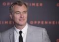 US-British film director Christopher Nolan poses upon his arrival for the “Premiere” of the movie “Oppenheimer” at the Grand Rex cinema in Paris on July 11, 2023. (Photo by JULIEN DE ROSA / AFP)