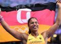 Germany’s Yemisi Ogunleye celebrates after winning the women’s shot put final of the athletics event at the Paris 2024 Olympic Games at Stade de France in Saint-Denis, north of Paris, on August 9, 2024. (Photo by Kirill KUDRYAVTSEV / AFP)